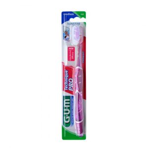 Brosse à dents medium compacte coloris aléatoire